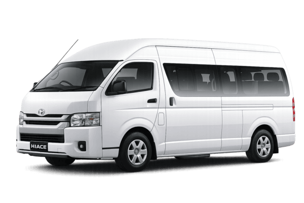 Toyota Hiace Commuter putih tampak serong depan dan samping untuk layanan sewa Hiace Jakarta dengan driver profesional