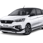 Suzuki All New Ertiga Hybrid putih dari Ria Rent Car untuk layanan sewa mobil dengan supir di Jakarta.