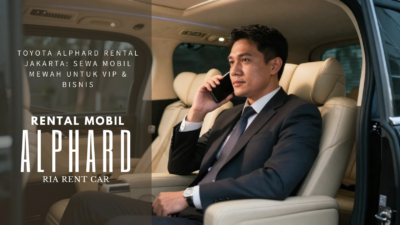 Eksekutif bisnis menelepon di kursi captain seat Toyota Alphard rental Jakarta oleh Ria Rent Car